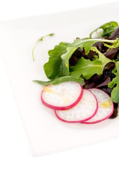 Tasty Greek salad isolated on white background.