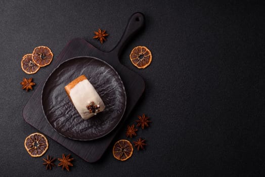 Round sweet New York roll croissant with pistachio cream filling on a dark concrete background