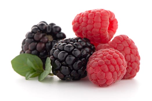 Raspberry with blackberry on white background.