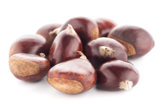 Chestnuts with shell isolated on white background.