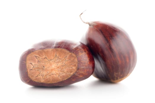 Chestnuts with shell isolated on white background.