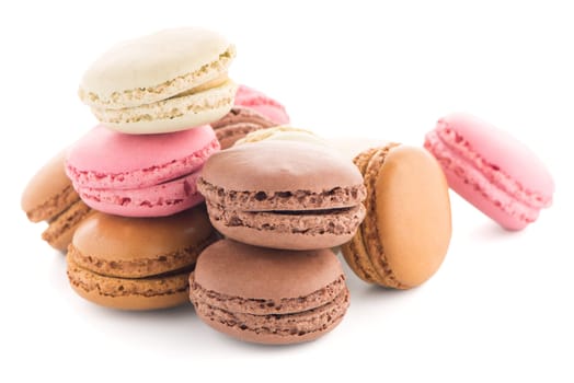Colorful French Macarons on the white background.