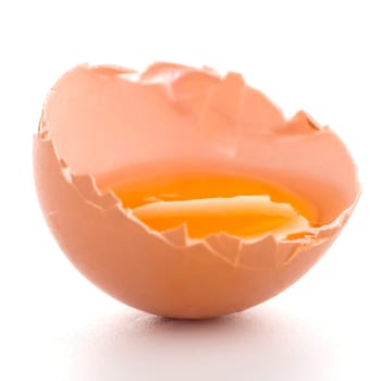 Broken egg isolated on white background