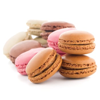 Colorful French Macarons on the white background.