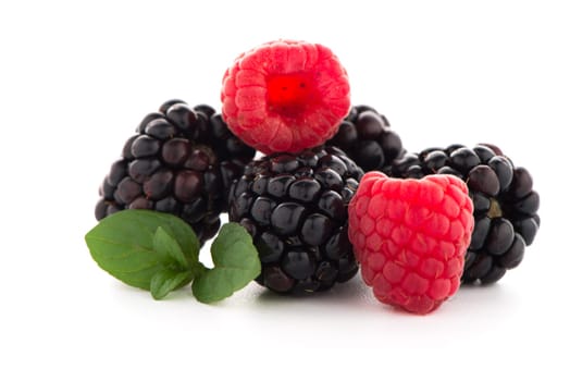 Raspberry with blackberry on white background.