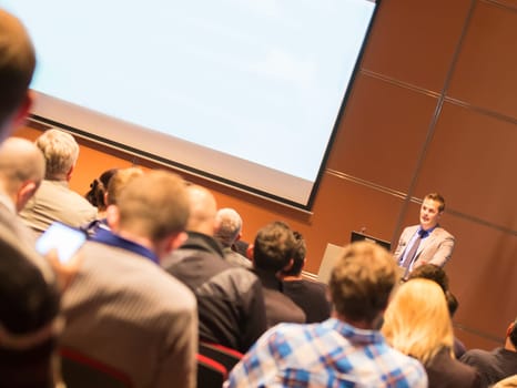 Speaker at Business Conference and Presentation. Audience at the conference hall. Business and Entrepreneurship.