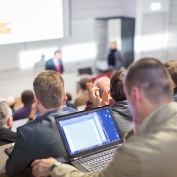 Business Conference and Presentation. Audience at the conference hall. Business and Entrepreneurship.