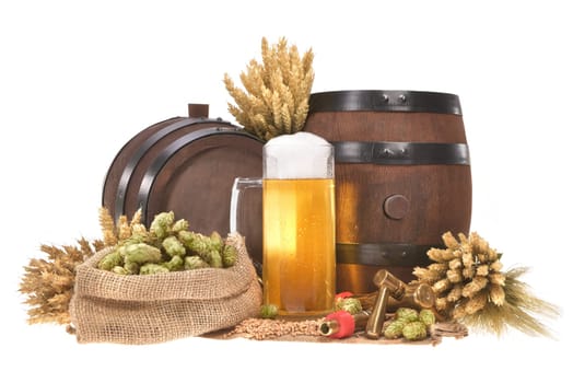 Beer glass and two beer barrels with wheat,barley,hops,malt insulated on white