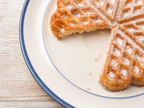 Delicious waffle on a rustic plate
