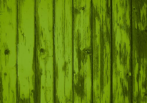 Weathered old light green wooden planks