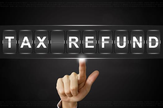 business hand pushing tax refund on Flipboard Display