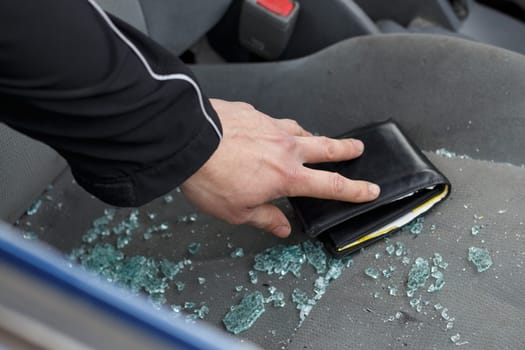 man steals wallet