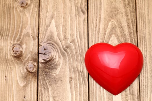 heart shape on grunge wooden background with copy space