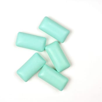 Five chewing gum on a white background