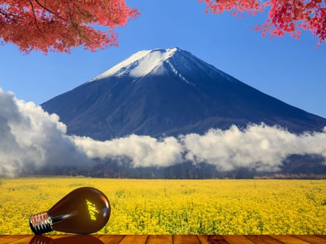 The image of beautiful fuji mountain japan with idea lamp