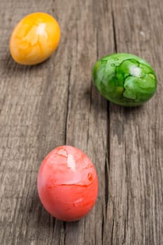 Coloured Easter on wood in portrait format