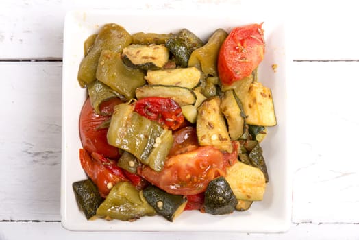 marinated peppers in a small colorful bowl