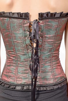 a corset on the white background