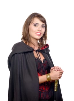 pretty girl dressed in a black cape for halloween