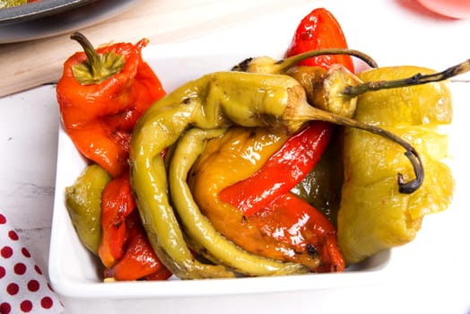 marinated peppers in a small colorful bowl