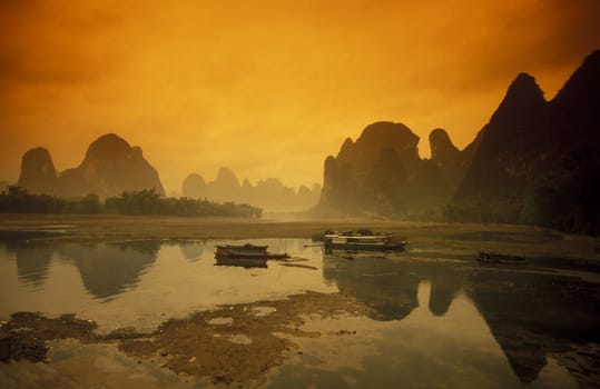 the landscape at the Li River near Yangshou near the city of Guilin in the Province of Guangxi in china in east asia.
