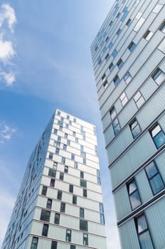 facades of modern office buildings in Almere, netherlands. It is the youngest and fastest growing city in the country, founded around 1975.