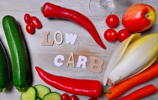Low Carb Vegetable Letters Text Wooden Background