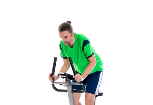 young man in green shirt train with fitness machine