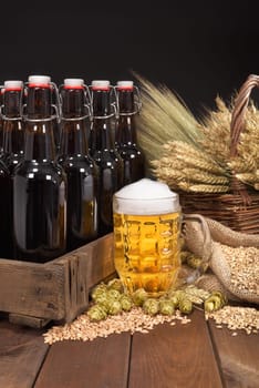 Beer box and beer glass with wheat,barley,hops and malt