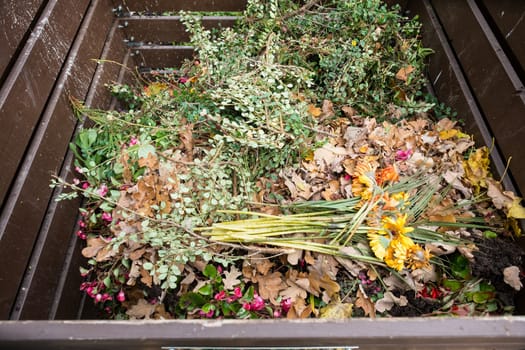 Plants and flowers as waste in a cemetery