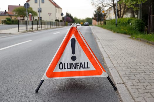 Warning triangle on the road