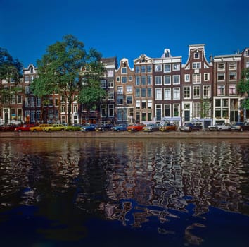 Streets in Amsterdam with canal , Netherlands