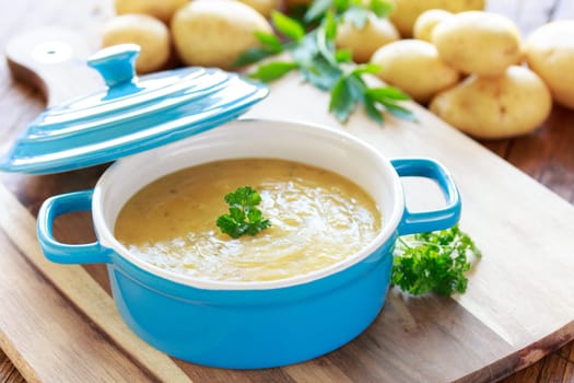 potato soup in blue pot