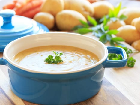 potato soup in blue pot
