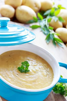 potato soup in blue pot