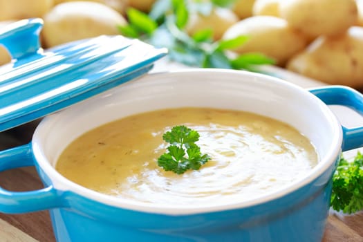 potato soup in blue pot