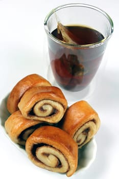 Cinnamon snails with tea glass
