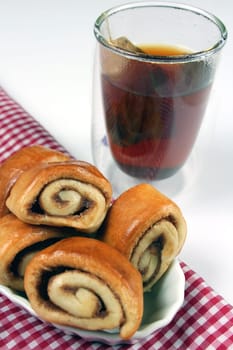 Cinnamon snails with tea glass