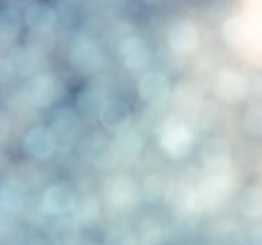 Defocused abstract yellow Christmas bokeh background