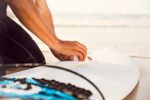 A surfer getting ready for the surf