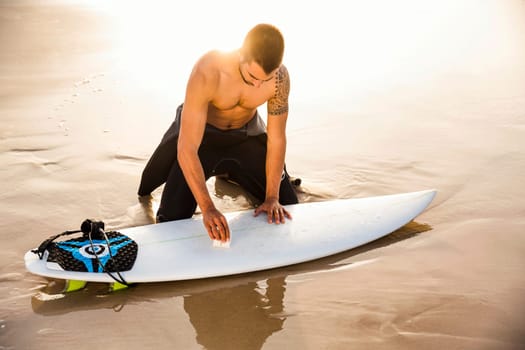 A surfer getting ready for the surf