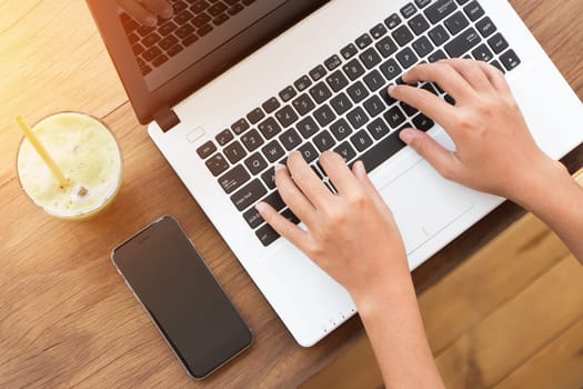 hand using laptop computer on top angle view