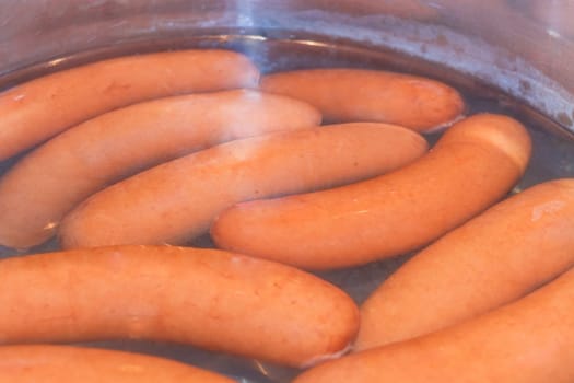 Bockwurst in a pot with boiling water...