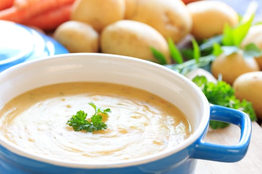 potato soup in blue pot