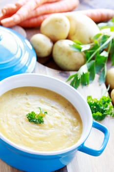 potato soup in blue pot