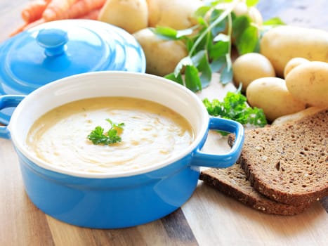 potato soup in blue pot