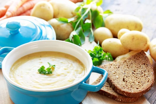 potato soup in blue pot