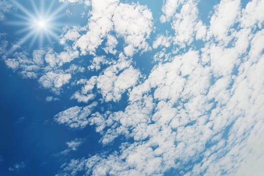 Blue sky with white cloud and over light the sun for design
