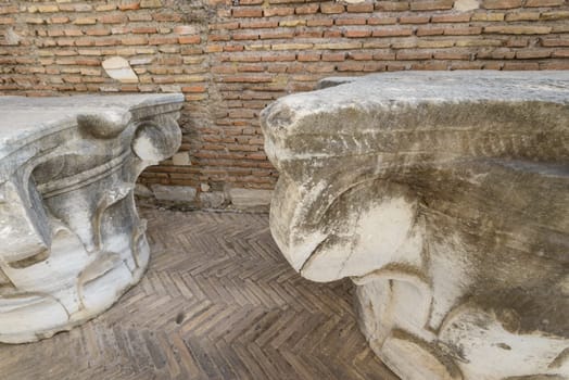Big marble Capitals outside the saint Paolo (Paul) church in Italy, Rome