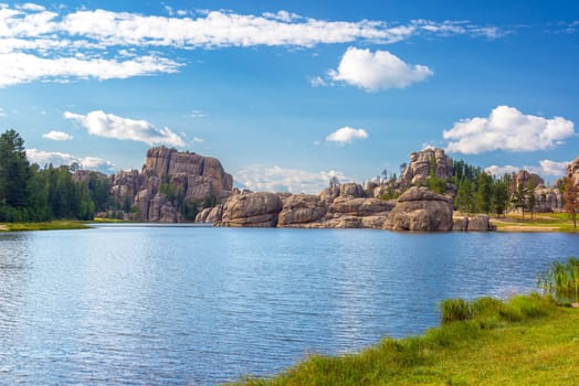 Dramatic rock formations on the shore of Sylvan Lake in Custer State Park